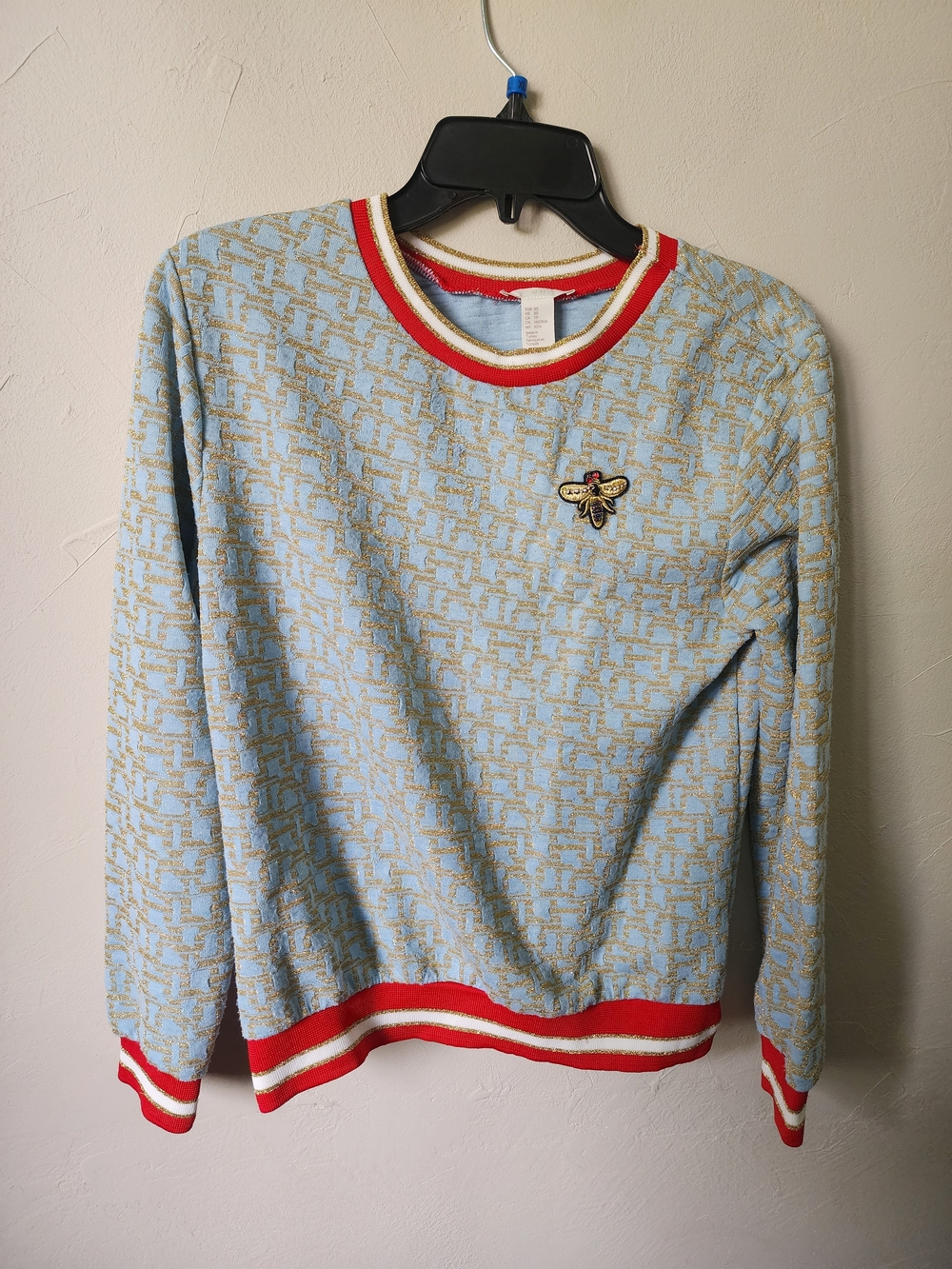H&M Light Blue Knit Sweater with Red Trim and Bee Patch Size XS